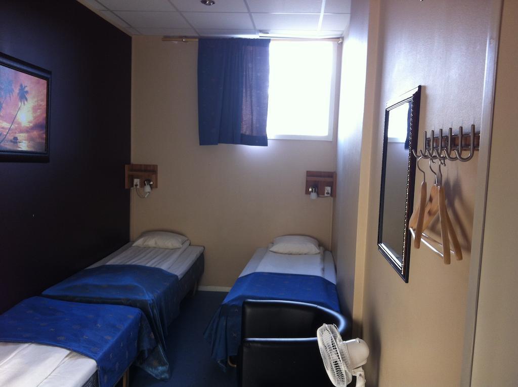 Chambre Triple Basique avec Salle de Bains Commune